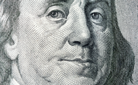 Rosto da nota de dólar sorrindo